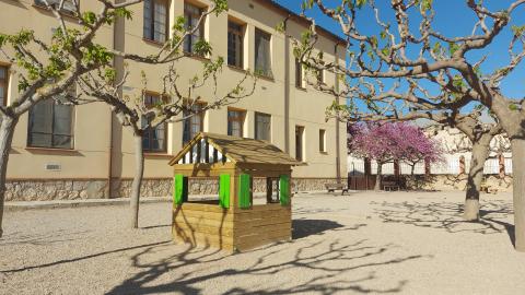 Caseta de fusta a la zona dels petits